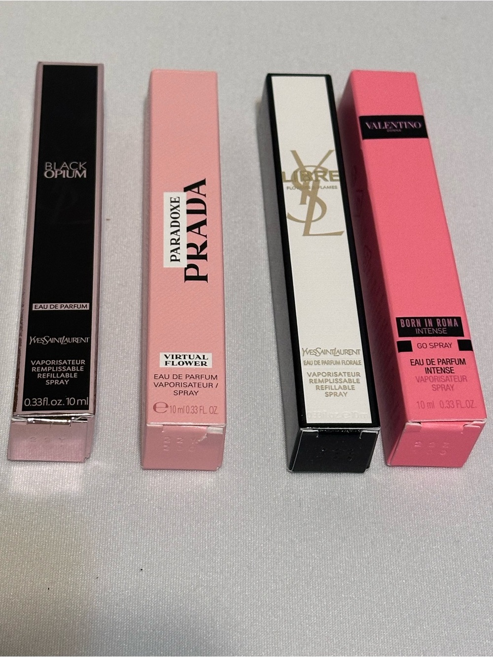 Yves Saint Laurent Refillable Travel Spray in White and Black